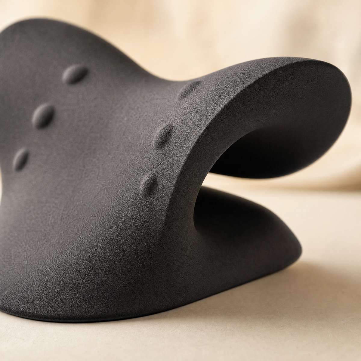 Close-up of the Arc's curved saddle and firm foam edge
